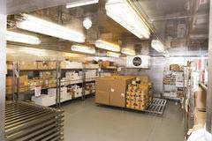 Freezer with stock shelves and pallets in the middle