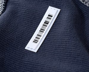 White security tag on blue shirt
